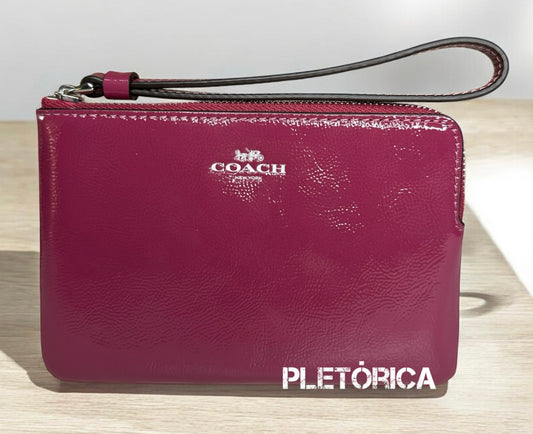 Muñequera Coach Charol Con Cierre Color Magenta